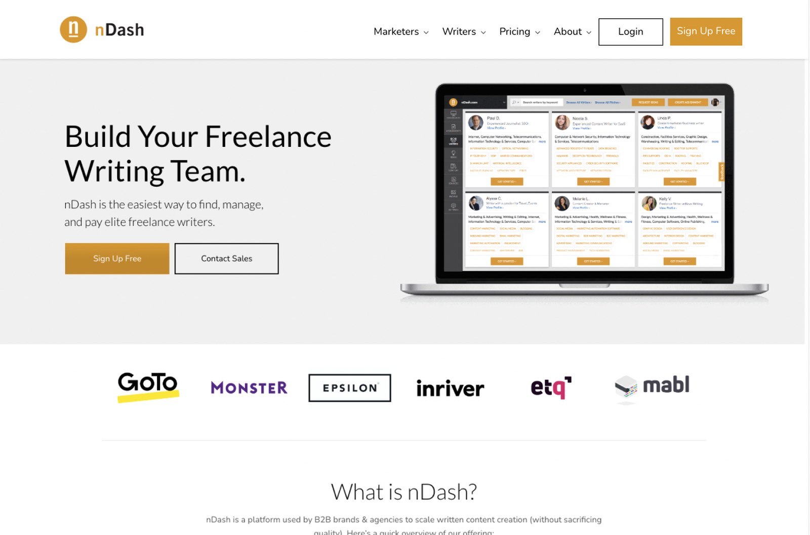 The previous nDash homepage: a muted orange and beige layout with a small laptop screenshot and client logos